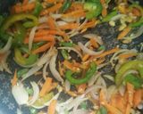 A picture of step 2 of Fried rice with chicken fried.