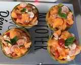 Une image de l'étape 13 de Melon farci aux tomates bicolores, feta, radis et menthe fraîche.