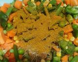 A picture of step 6 of Nigerian fried rice.