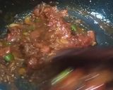 A picture of step 2 of Aloo baingan.