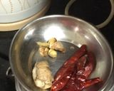 A picture of step 6 of Spicy Walnuts Masala Chicken Curry.
