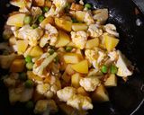 A picture of step 3 of Cauliflower Peas Potato Sabzi.