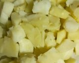 A picture of step 1 of Dahi Aloo.