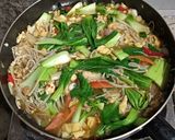 Foto langkah ke 4 dari resep Tumis Jamur Enoki.
