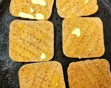 A picture of step 1 of My Melted Cheese & Red Onion Toasted Thins.🥰.