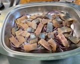 A picture of step 13 of Marinated Herring with Red Onions and Carrot Kari-Style.
