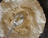 A picture of step 12 of Maharashtrian Lunch Thali of Bhakri, Vangyache Bharit, Phodniche Varan, Gul aani Tup.