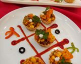 A picture of step 4 of Mexican corn and bean chaat.