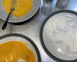 A picture of step 2 of Chicken Milanese.
