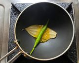 A picture of step 5 of Korui Begun diye Moong Dal / Moong Dal with Small Eggplants for lunch in Thakurbari style.