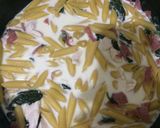 A picture of step 2 of Cheesy Spinach Penne.