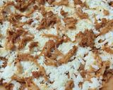A picture of step 6 of Tandoori chicken pizza on stove.