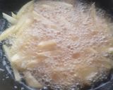 A picture of step 3 of Mayo garlic French Fries.