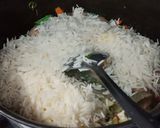 A picture of step 5 of Nav Ratan Pulao.