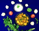 A picture of step 8 of Cauliflower Peas Curry.