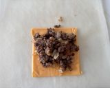 A picture of step 4 of Cheeseburger Spring Rolls.