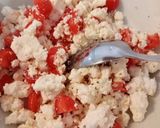A picture of step 2 of Feta and tomato stuffed courgettes.