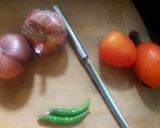 A picture of step 1 of Egg Ghotala with omelette.