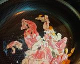 A picture of step 4 of Stir-Fried Pork with Scallions.