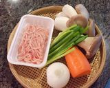 A picture of step 1 of Chicken and King Oyster Mushroom Spring Rolls with Vegetables.