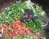 A picture of step 3 of Schezwan fried rice sizzler.