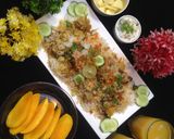 A picture of step 1 of ChatpatiBombay biryani with tang twist, yogurt salad, mango, apple cubes.