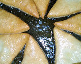 A picture of step 6 of Triangle shaped stuffed bread.