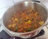 A picture of step 3 of Brinjal potato mint masala.