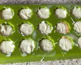 A picture of step 2 of Tricolour chocolate with orange, pistachios and coconut flavour.
