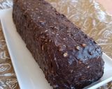 Foto del paso 14 de la receta Plumcake vegano de chocolate relleno de coulis de arándanos y cobertura de ganache chocolate