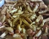 Foto del paso 4 de la receta: Revuelto de salchipapas