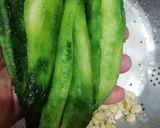 A picture of step 2 of Bitter Gourd with Tomato.