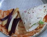 A picture of step 6 of Chicken tortilla wrap.