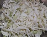 A picture of step 4 of Triple schezwan fried rice.