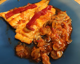 Foto del paso 4 de la receta: Bacalao con cebolla, champis y salsa de tomate y pimientos de piquillo