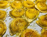 A picture of step 6 of Sheet Pan Pierogis with Italian Sausage.