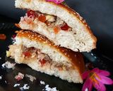 A picture of step 14 of Dilkush or sweet bread with coconut and tutti frutti filling.