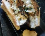 A picture of step 7 of Cheese spread spring onion potato sandwich.