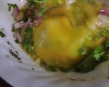 A picture of step 2 of Indian Bun omllette.