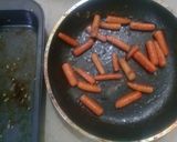 A picture of step 10 of Orange Glaze Roasted BabyCarrots.