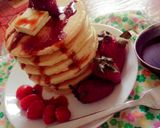A picture of step 19 of Greek pan cake with honey.