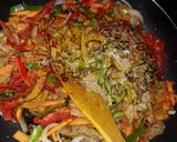 A picture of step 3 of Singapore noodles/ rice sticks.