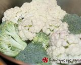A picture of step 1 of Cauliflower and broccoli with feta cheese sauce.