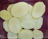 Foto del paso 1 de la receta: Milhojas de patata confitada y bacalao con su salsa pil pil