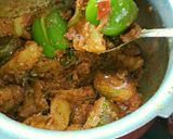 A picture of step 2 of Vangi shimla mirch masala bhaji.