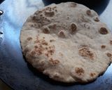 A picture of step 12 of Pita Bread Chick Pea Kidney bean filling with Tzatziki sauce.