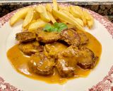 A picture of step 14 of Pork Tenderloin in Sauce.