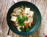 Hình bước làm 4 của món Canh Nấm Bào Ngư Nấu Cà Chua