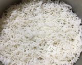 A picture of step 10 of Veg Hyderabadi Biryani with Boondi raita.