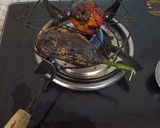 A picture of step 2 of Littichokha with baigan chutney and fried chilli onions.